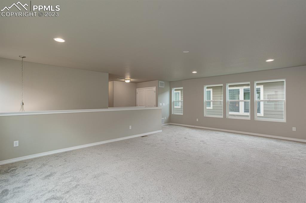 4336 Samaritan Loop Colorado Springs, CO 80916 - Photo 16 of 22 a view of an empty room with a window