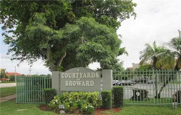 a view of park with sign board