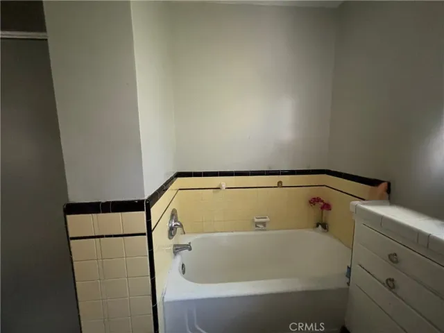 a bathroom with a toilet and a sink