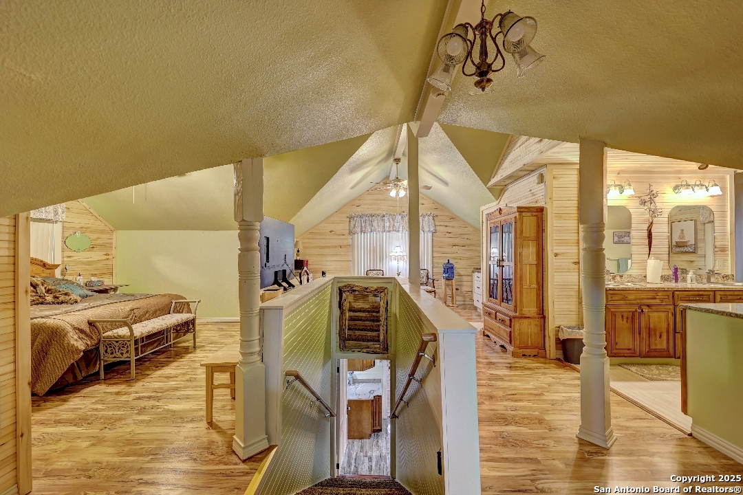 101 North 11th Street Junction, TX 76849 - Photo 11 of 26 a view of a livingroom with furniture and a floor to ceiling window