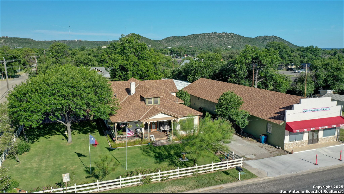 101 North 11th Street Junction, TX 76849 - Photo 2 of 26 an aerial view of a house