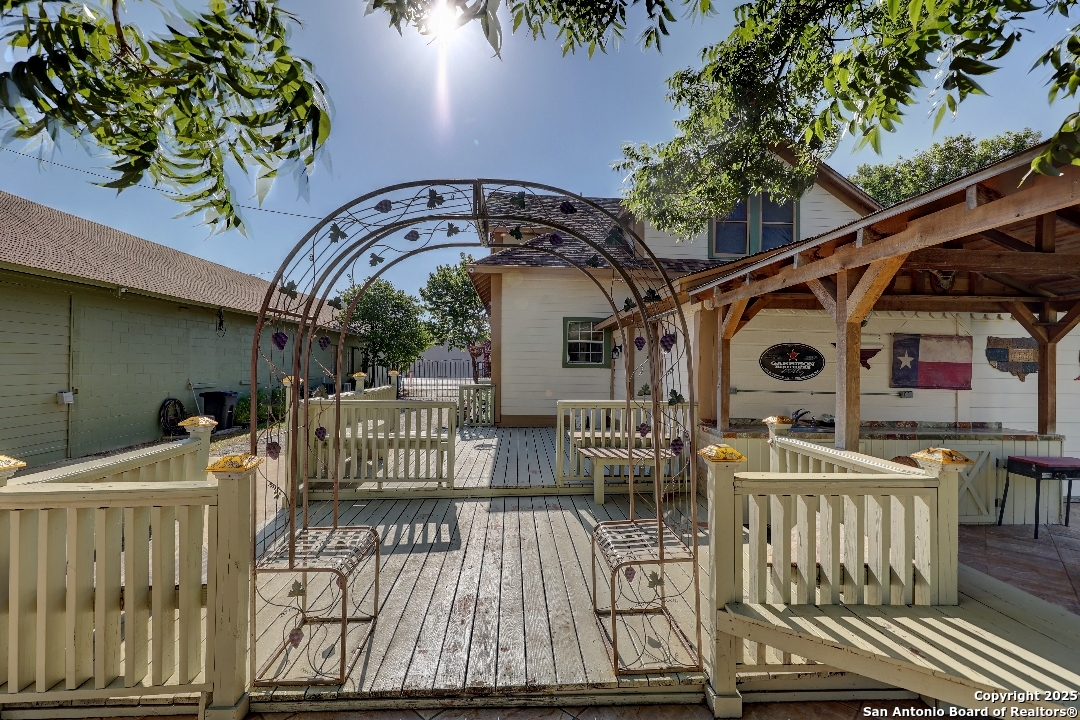 101 North 11th Street Junction, TX 76849 - Photo 24 of 26 a roof deck with table and chairs