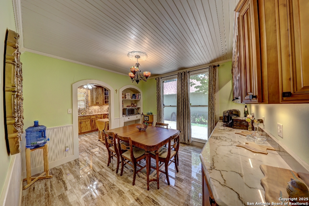 101 North 11th Street Junction, TX 76849 - Photo 7 of 26 a view of a dining room with furniture window and outside view