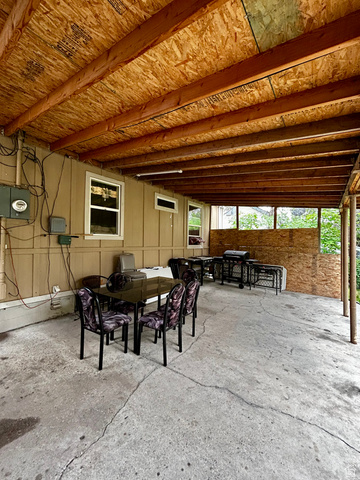 1931 Harrison Boulevard Ogden, UT 84401 - Photo 15 of 21 Covered outdoor concrete patio with exposed wood joists.