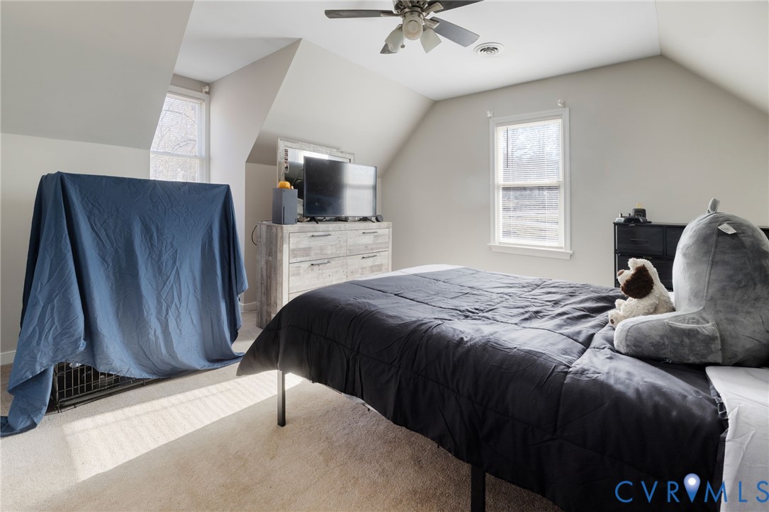 2015 Oneida Road Powhatan, VA 23139 - Photo 23 of 24 Bedroom with vaulted ceiling, carpet, a ceiling fa