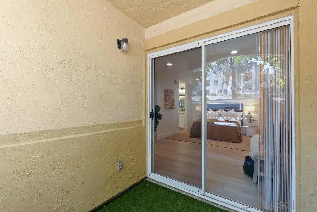 761 Brookstone Road, Unit 102 Chula Vista, CA 91913 - Photo 26 of 34 a bathroom with a glass shower door and a sink