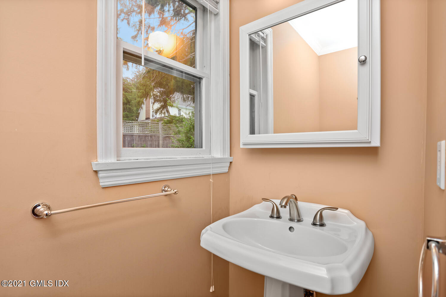 284 Glenbrook Road Stamford, CT 06906 - Photo 11 of 45 a bathroom with a sink and a mirror