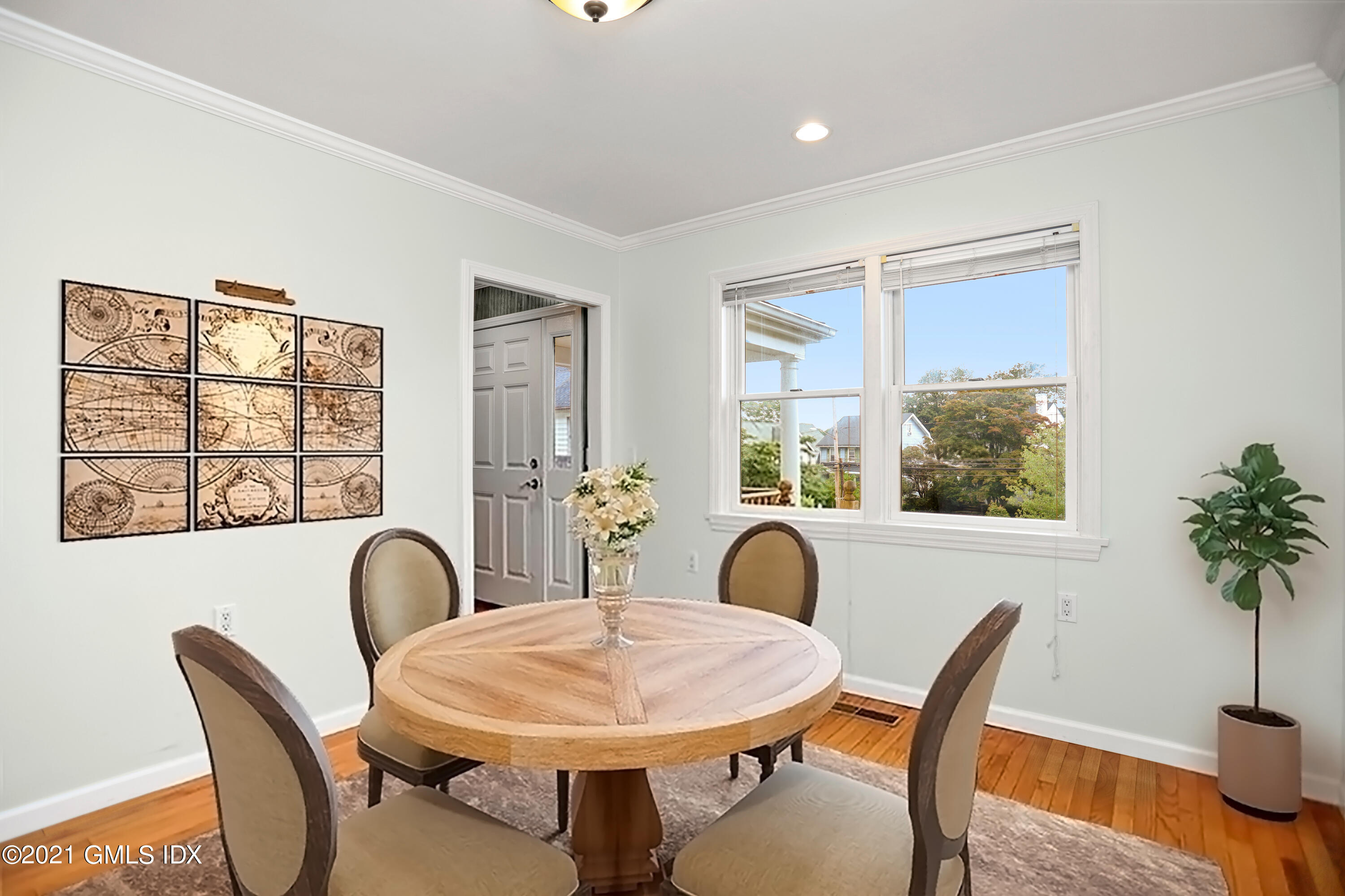 284 Glenbrook Road Stamford, CT 06906 - Photo 12 of 45 a view of a dining room with furniture window and wooden floor