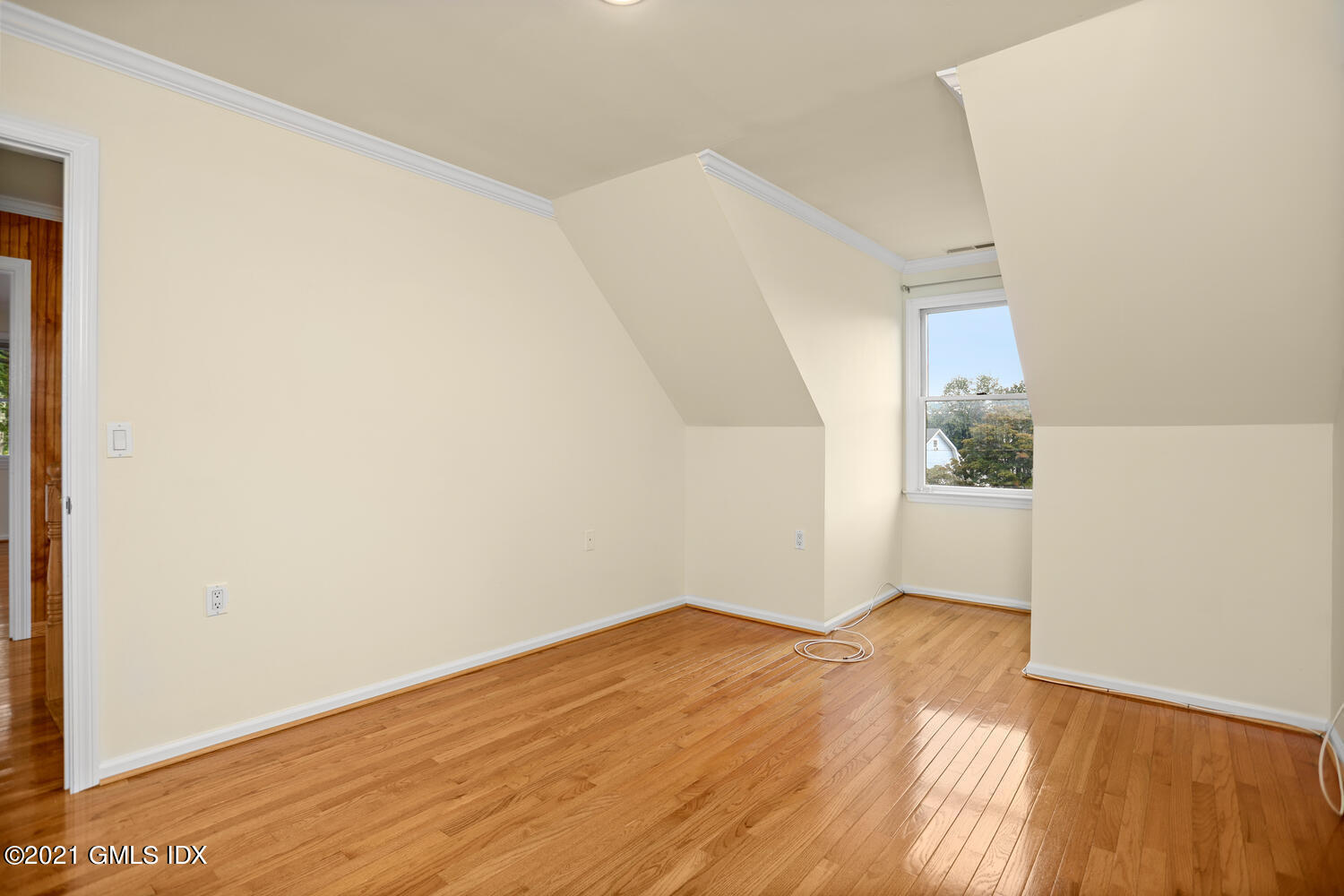 284 Glenbrook Road Stamford, CT 06906 - Photo 26 of 45 a view of empty room with wooden floor