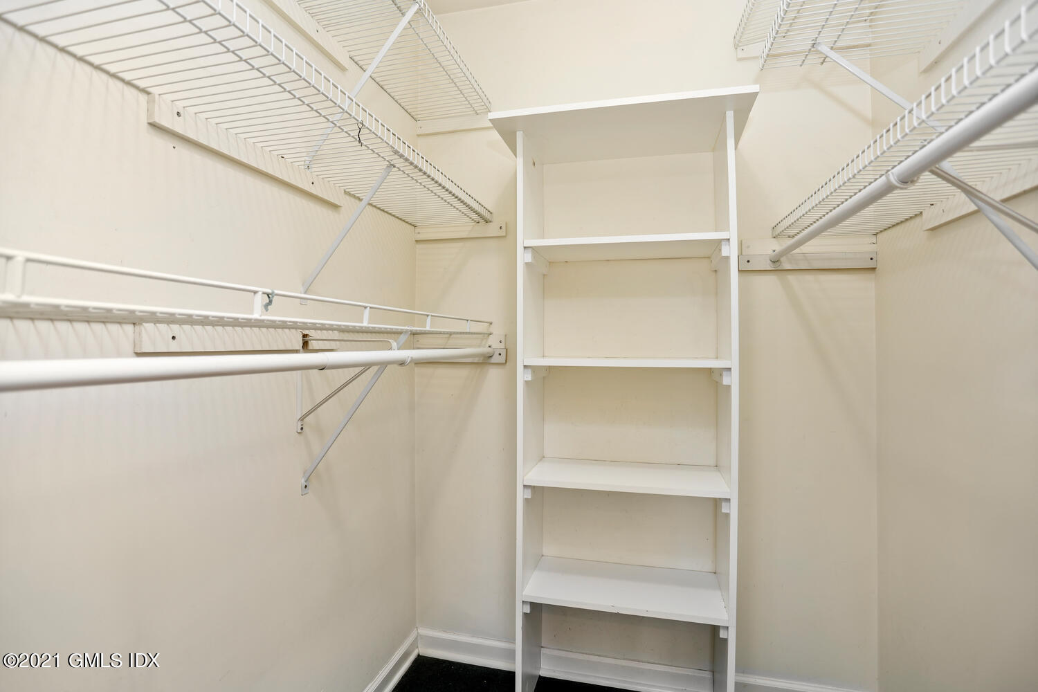 284 Glenbrook Road Stamford, CT 06906 - Photo 28 of 45 a view of an empty walk in closet