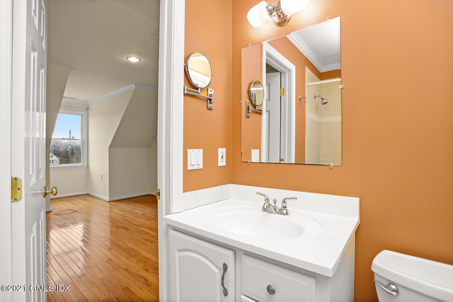 284 Glenbrook Road Stamford, CT 06906 - Photo 29 of 45 a bathroom with a sink and a mirror