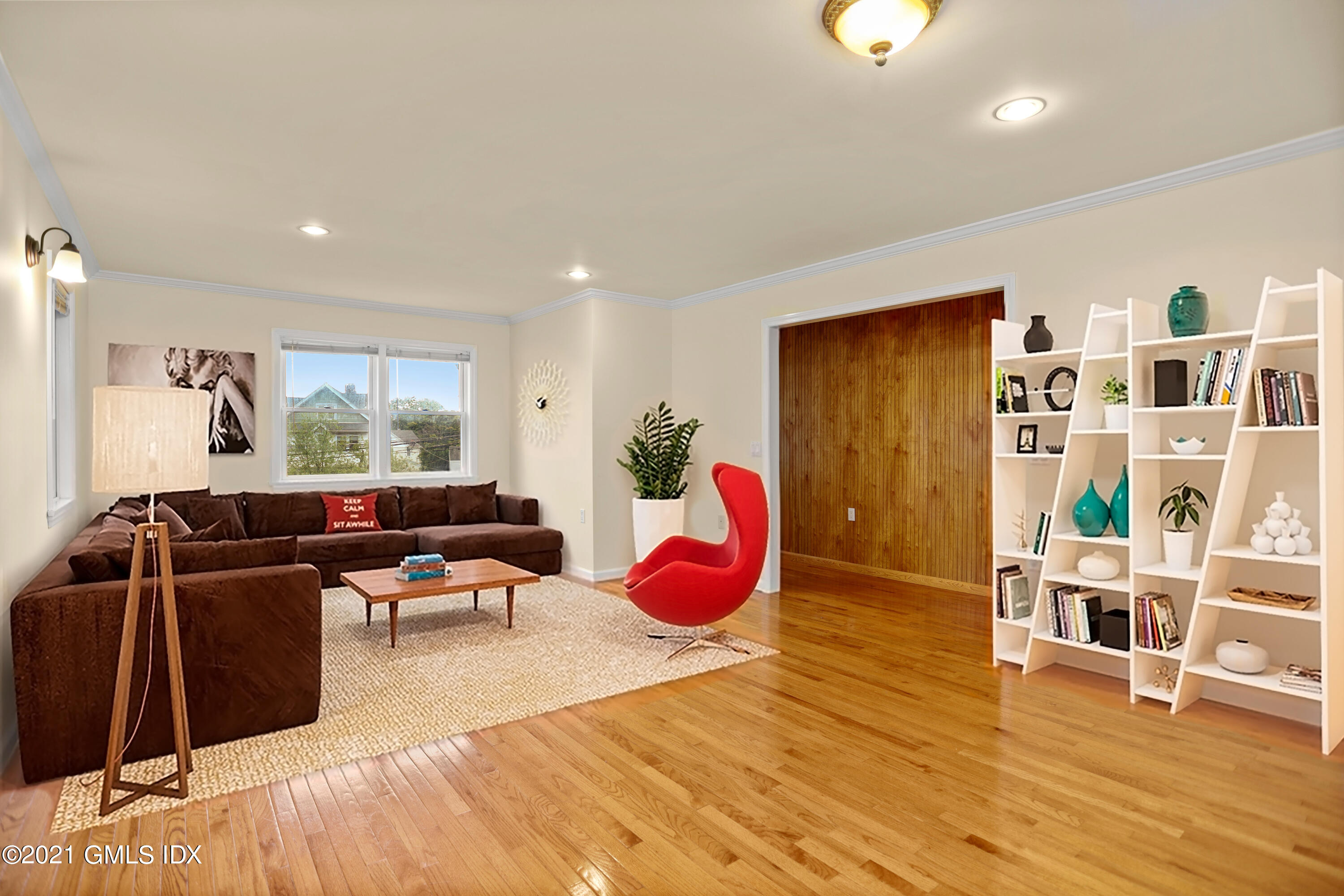 284 Glenbrook Road Stamford, CT 06906 - Photo 8 of 45 a living room with furniture and wooden floor