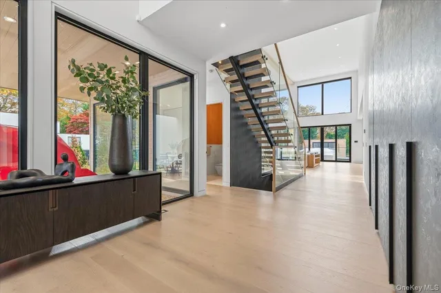 a view of a hallway with washer and dryer