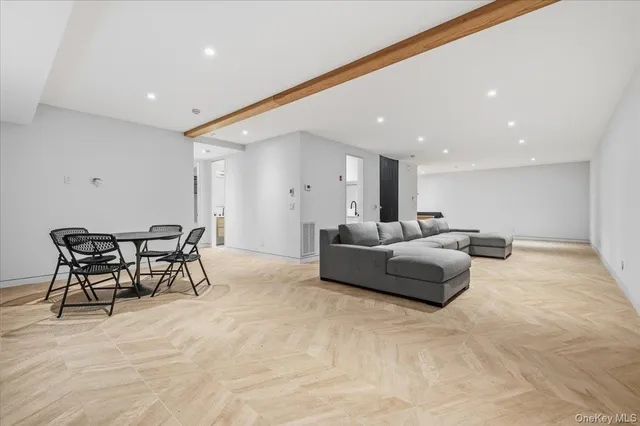 a view interior of a house with wooden floor and large windows