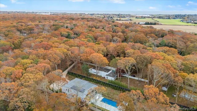 a view of a room that has a bench and storage