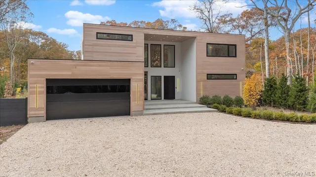 a front view of a house with yard