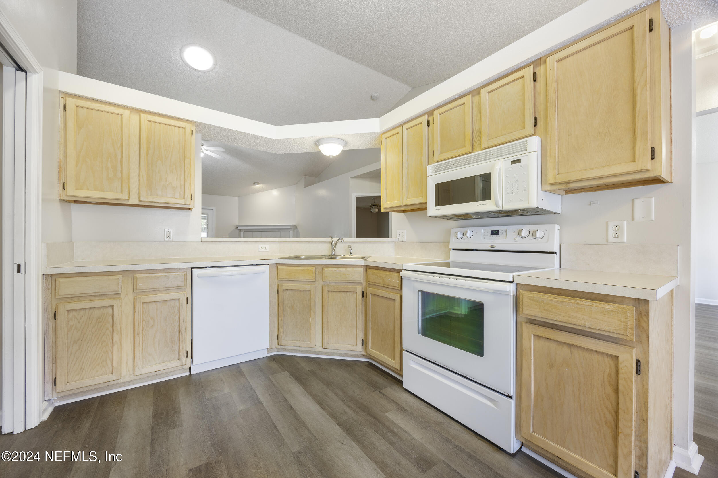 781 Nottingham Forest Circle St. Johns, FL 32259 - Photo 10 of 43 a kitchen with stainless steel appliances granite countertop a sink a stove and cabinets