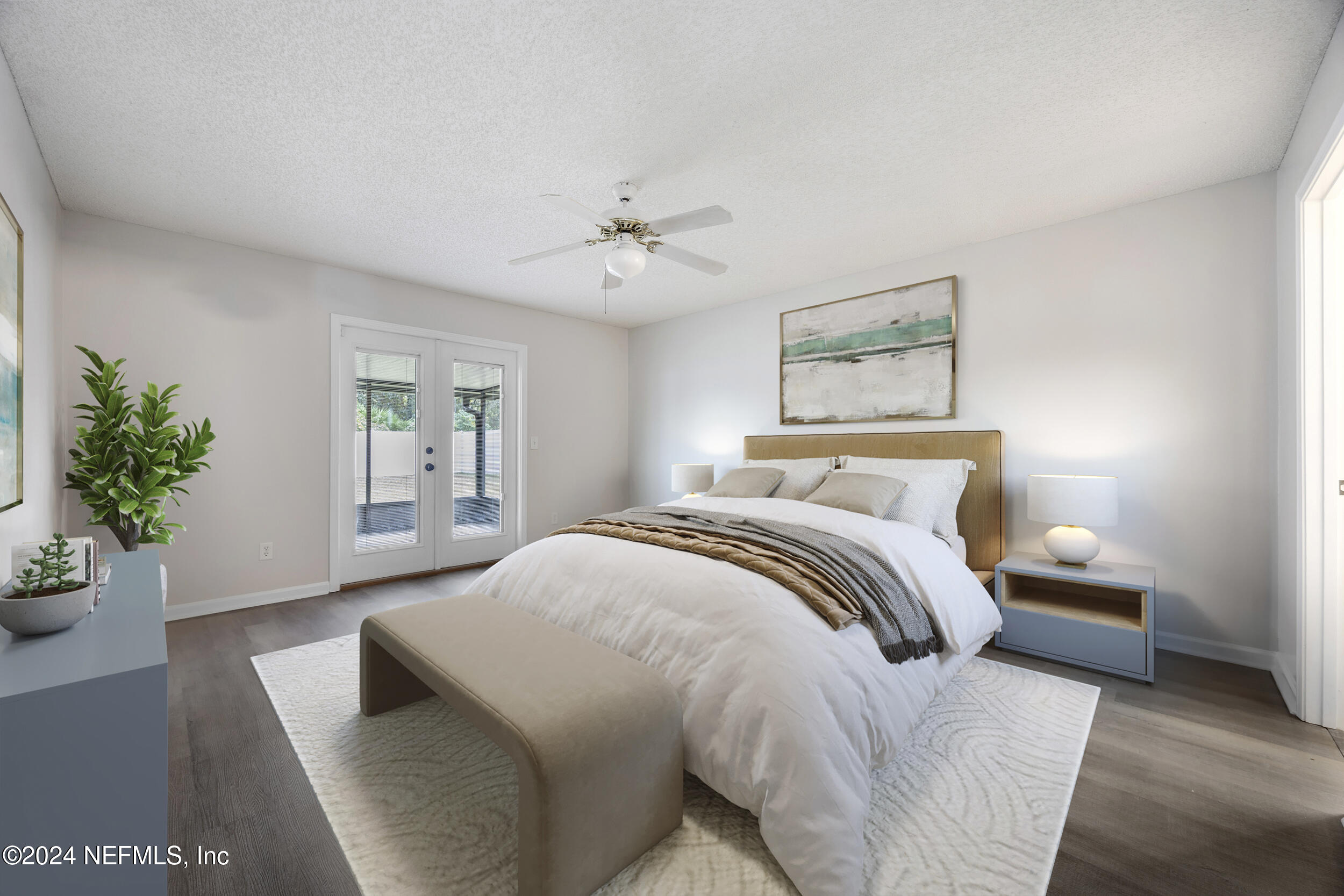 781 Nottingham Forest Circle St. Johns, FL 32259 - Photo 17 of 43 a bedroom with bed and wooden floor