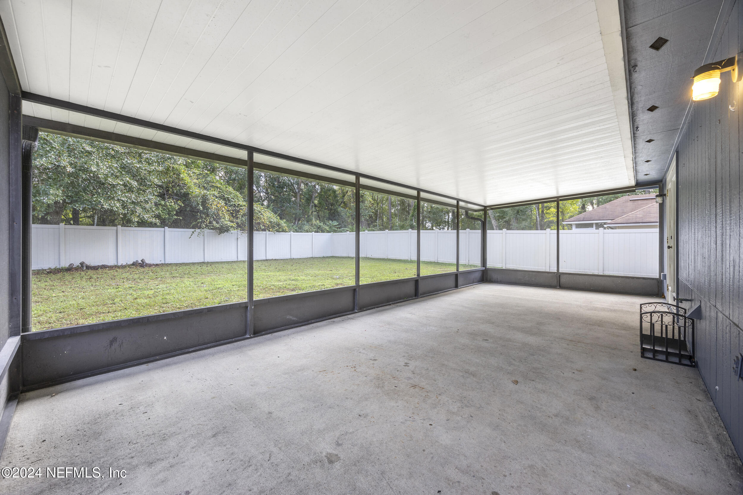 781 Nottingham Forest Circle St. Johns, FL 32259 - Photo 26 of 43 a view of an empty room with windows