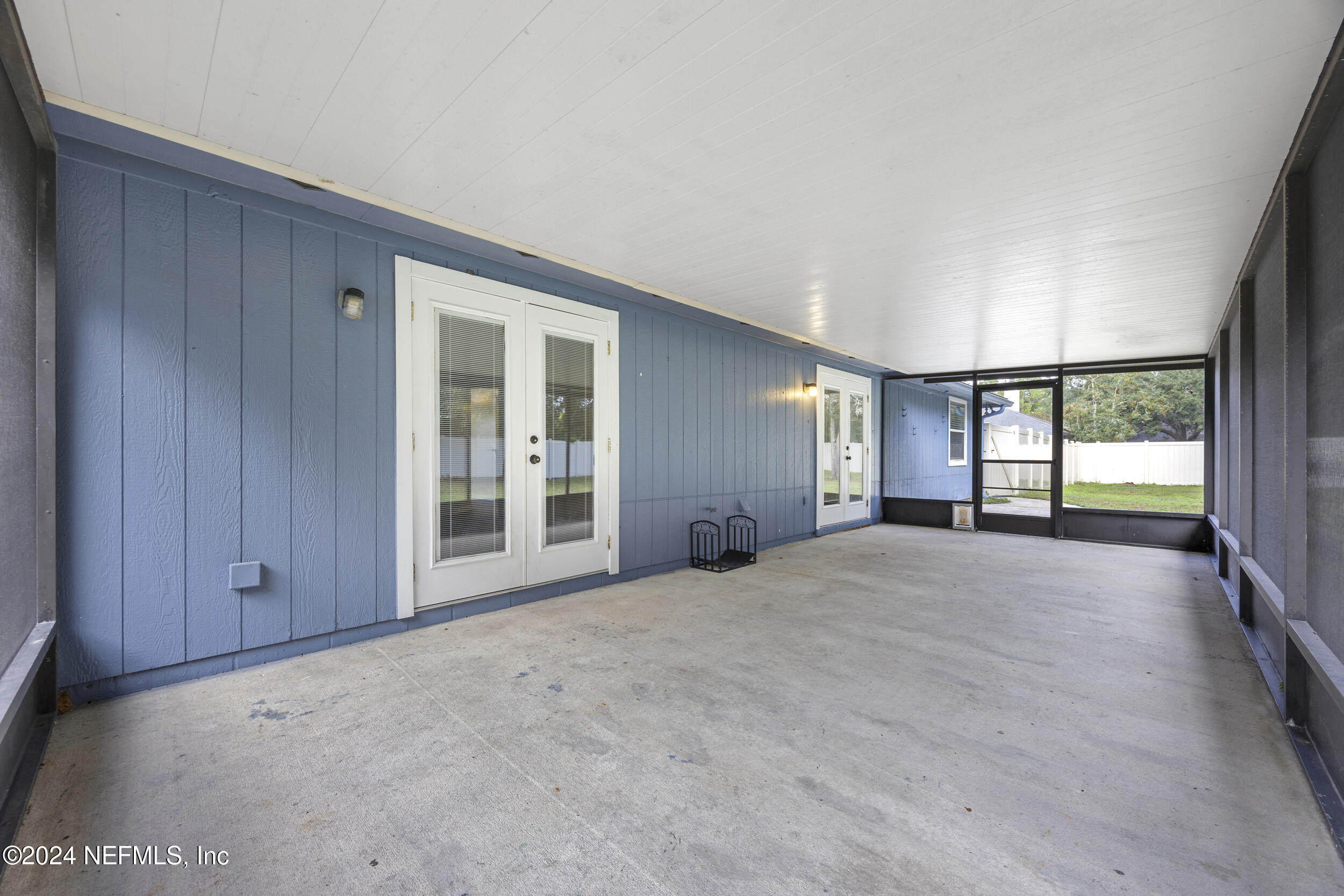 781 Nottingham Forest Circle St. Johns, FL 32259 - Photo 27 of 43 a view of an empty room with a window and fireplace