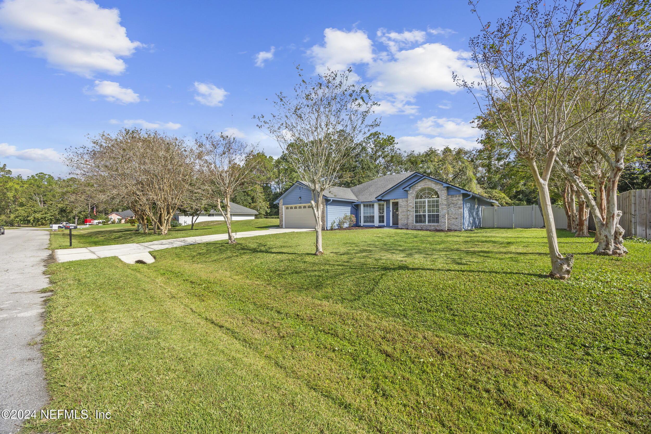 781 Nottingham Forest Circle St. Johns, FL 32259 - Photo 34 of 43 a house view with garden space and trees