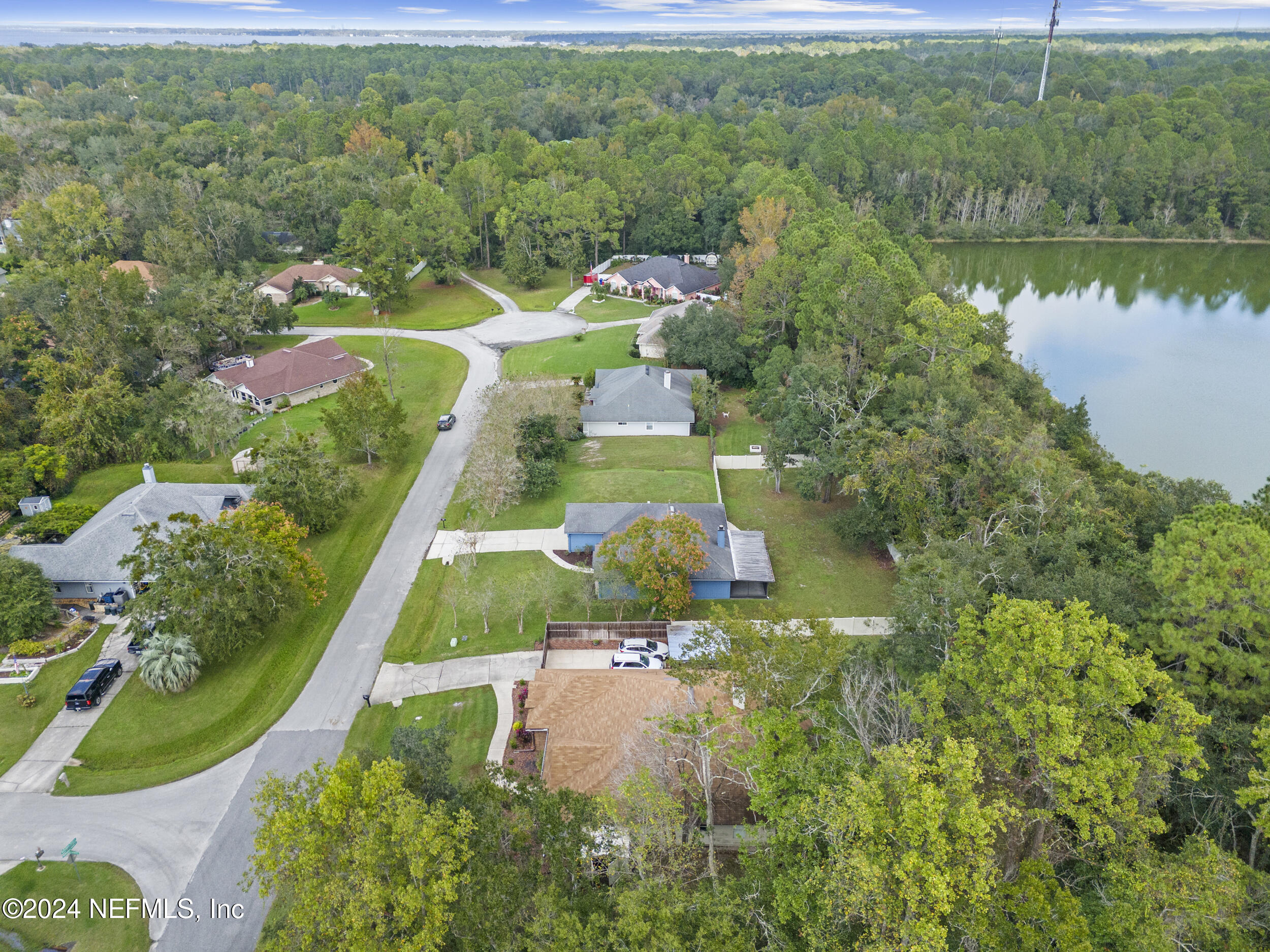 781 Nottingham Forest Circle St. Johns, FL 32259 - Photo 38 of 43 a view of a lake with a yard