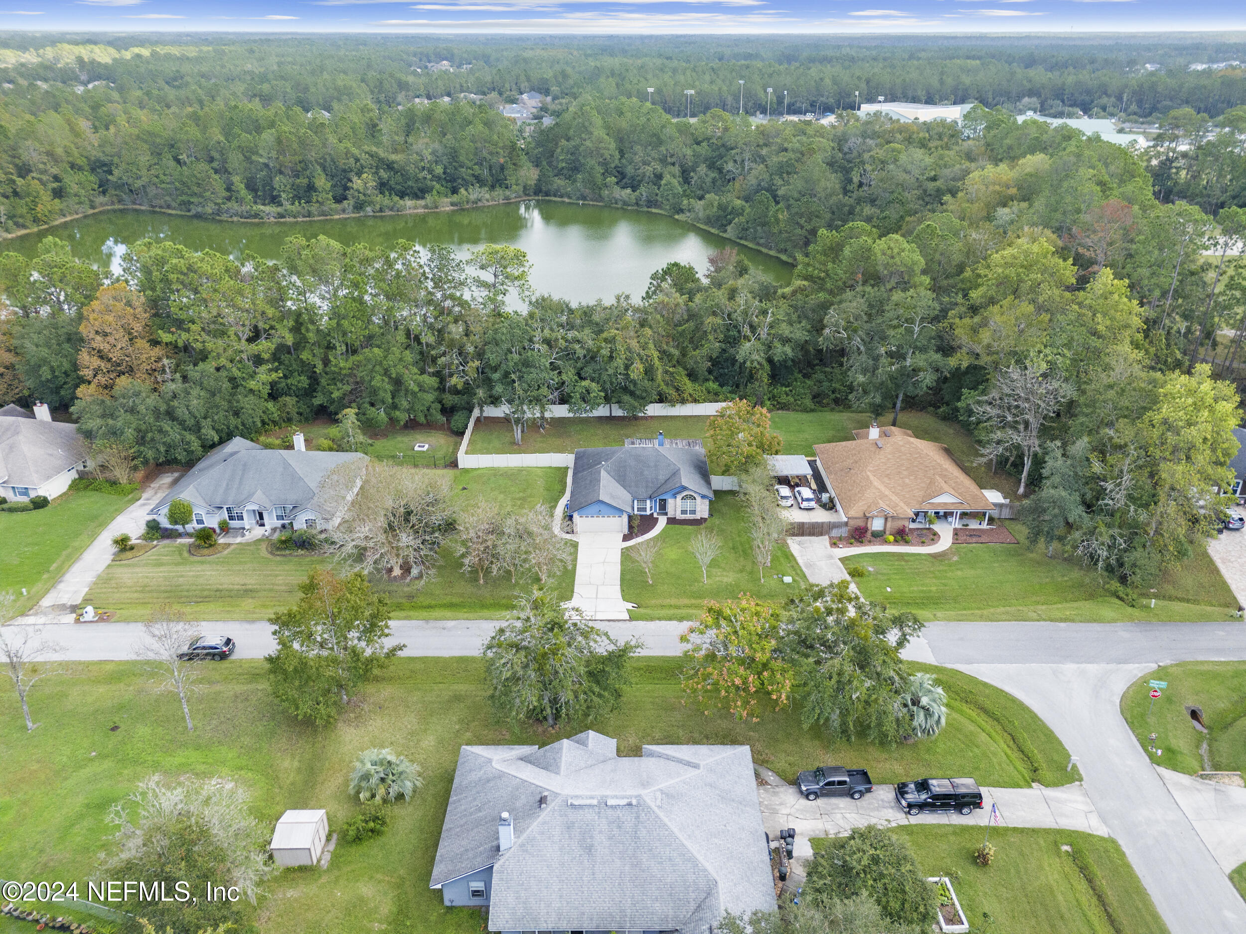 781 Nottingham Forest Circle St. Johns, FL 32259 - Photo 41 of 43 an aerial view of residential houses with outdoor space and lake view