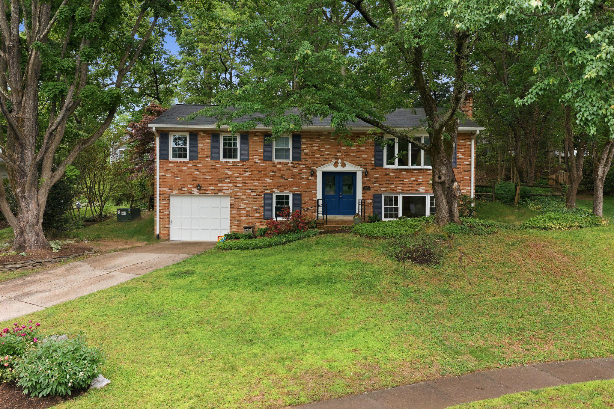9523 Rockport Road Vienna, VA 22180 - Photo 47 of 53 One-car garage and driveway, set back from street.