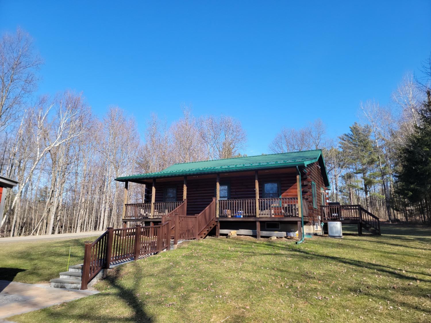 127 Lippitt Development Road Middlefield, NY 13326 - Photo 1 of 1 Front of cabin
