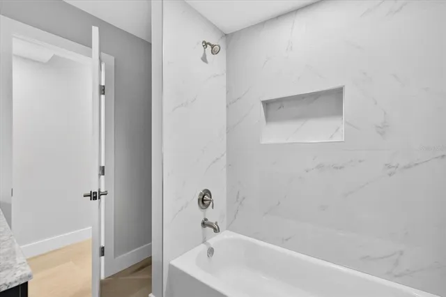 a bathroom with a bathtub