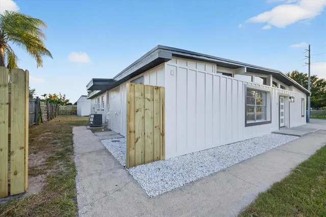 a view of a brick house with a window