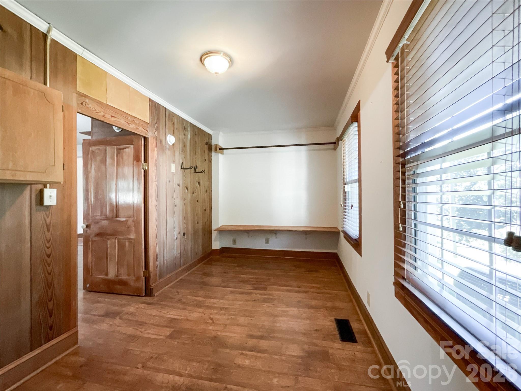 2006 Okeewemee Road Star, NC 27356 - Photo 12 of 47 a view of a hallway with wooden floor and staircase
