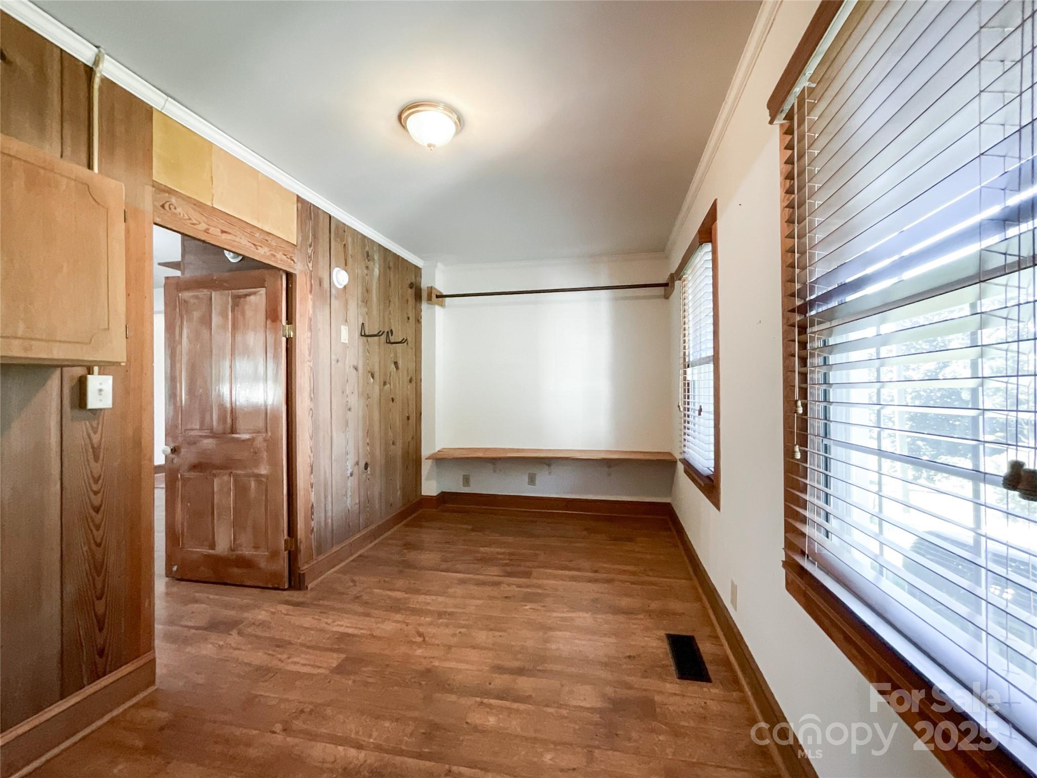 2006 Okeewemee Road Star, NC 27356 - Photo 12 of 48 a view of a hallway with wooden floor and staircase