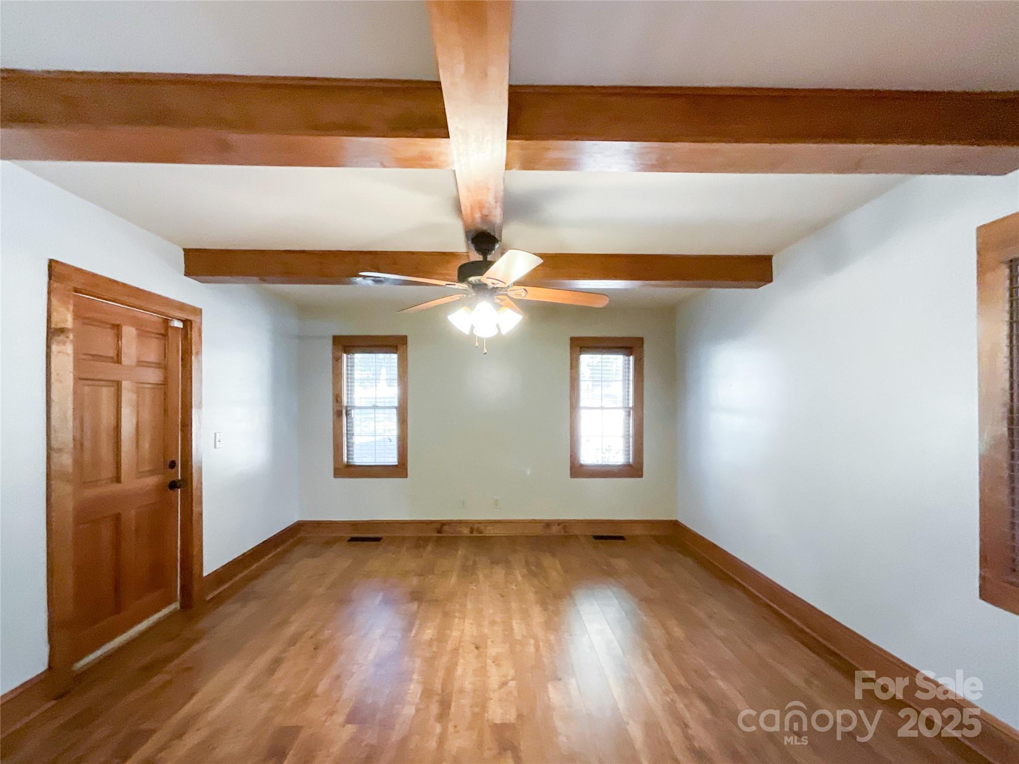 2006 Okeewemee Road Star, NC 27356 - Photo 14 of 48 wooden floor in an empty room with a window