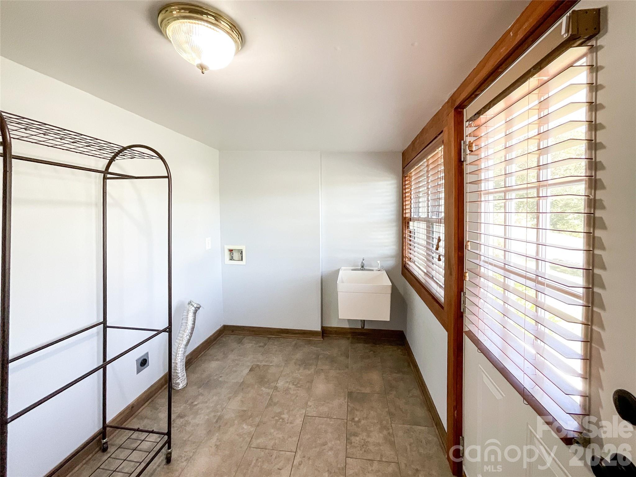 2006 Okeewemee Road Star, NC 27356 - Photo 20 of 47 a bathroom with a tub mirror and window