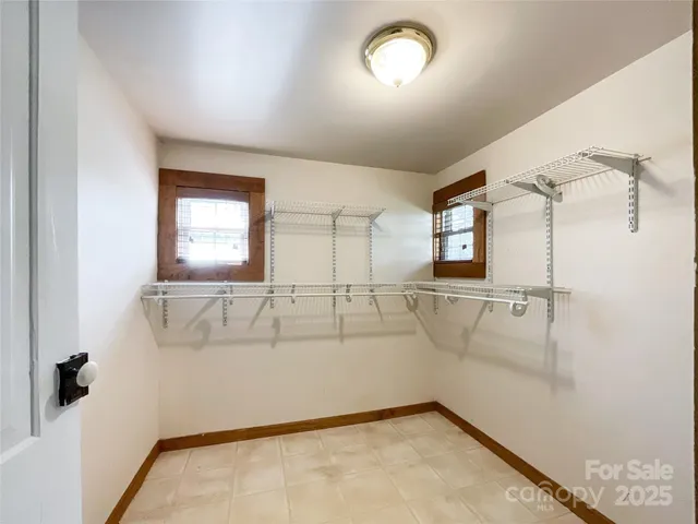 a bathroom with a toilet sink and a shower