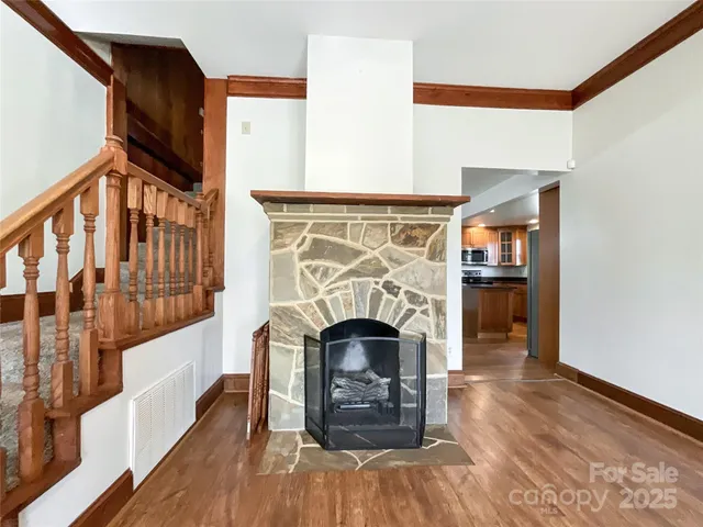 a bedroom with furniture and window