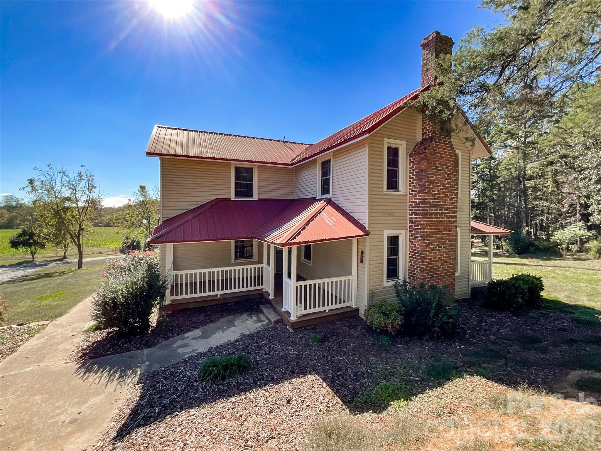 2006 Okeewemee Road Star, NC 27356 - Photo 3 of 47 a front view of a house with garden