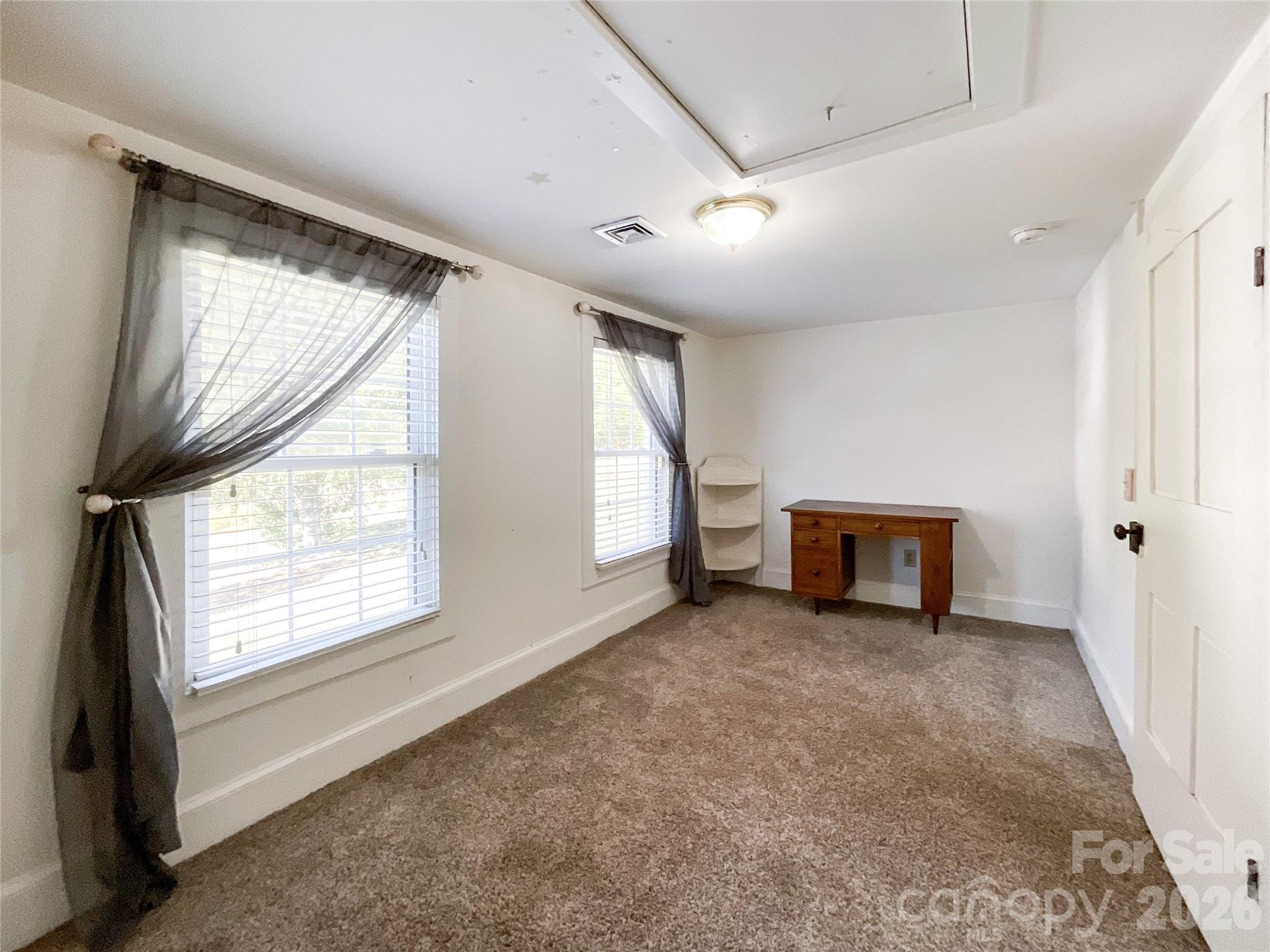 2006 Okeewemee Road Star, NC 27356 - Photo 39 of 47 a view of an empty room with a fireplace and a window