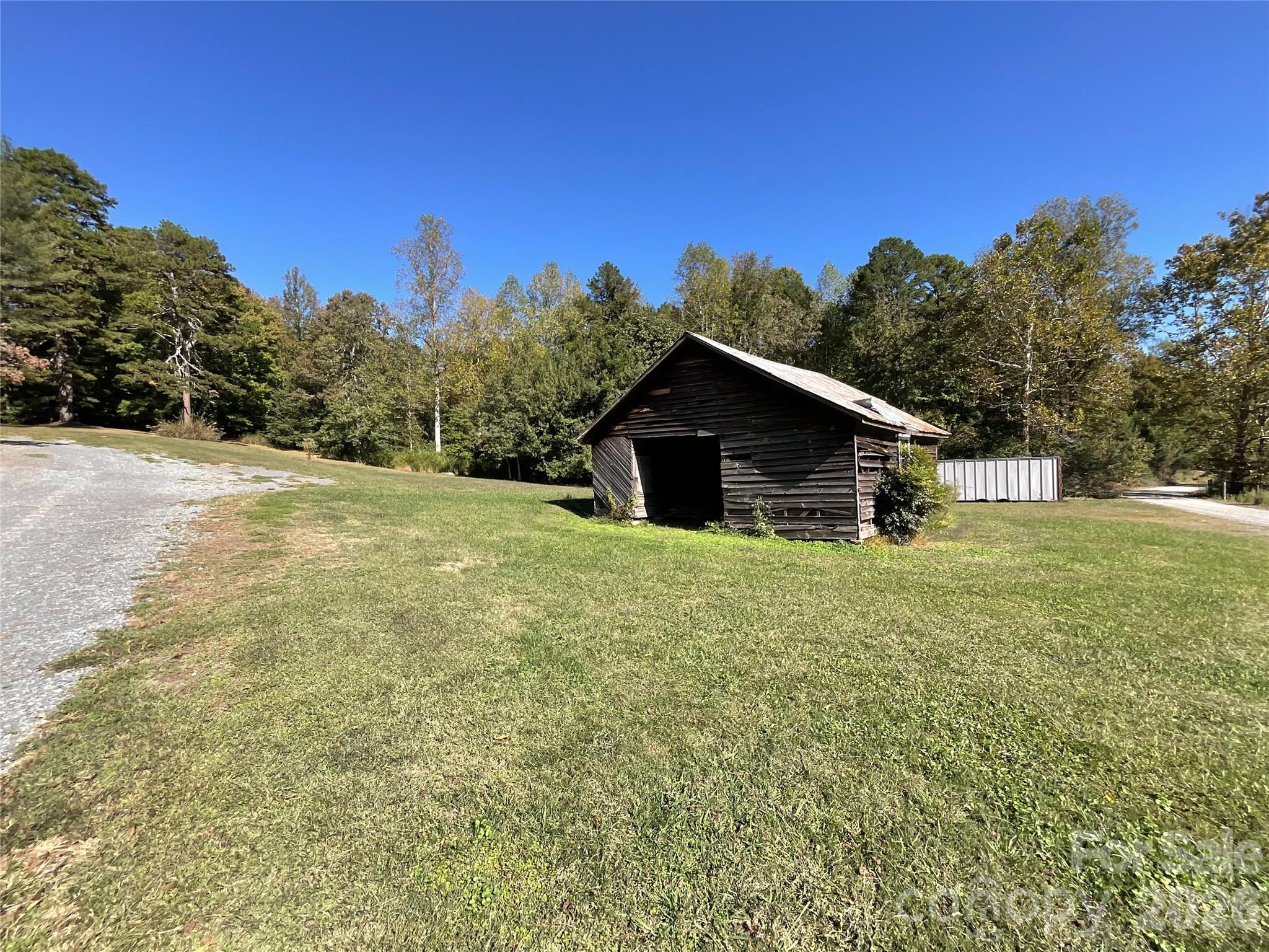 2006 Okeewemee Road Star, NC 27356 - Photo 40 of 47 a view of a house with a backyard
