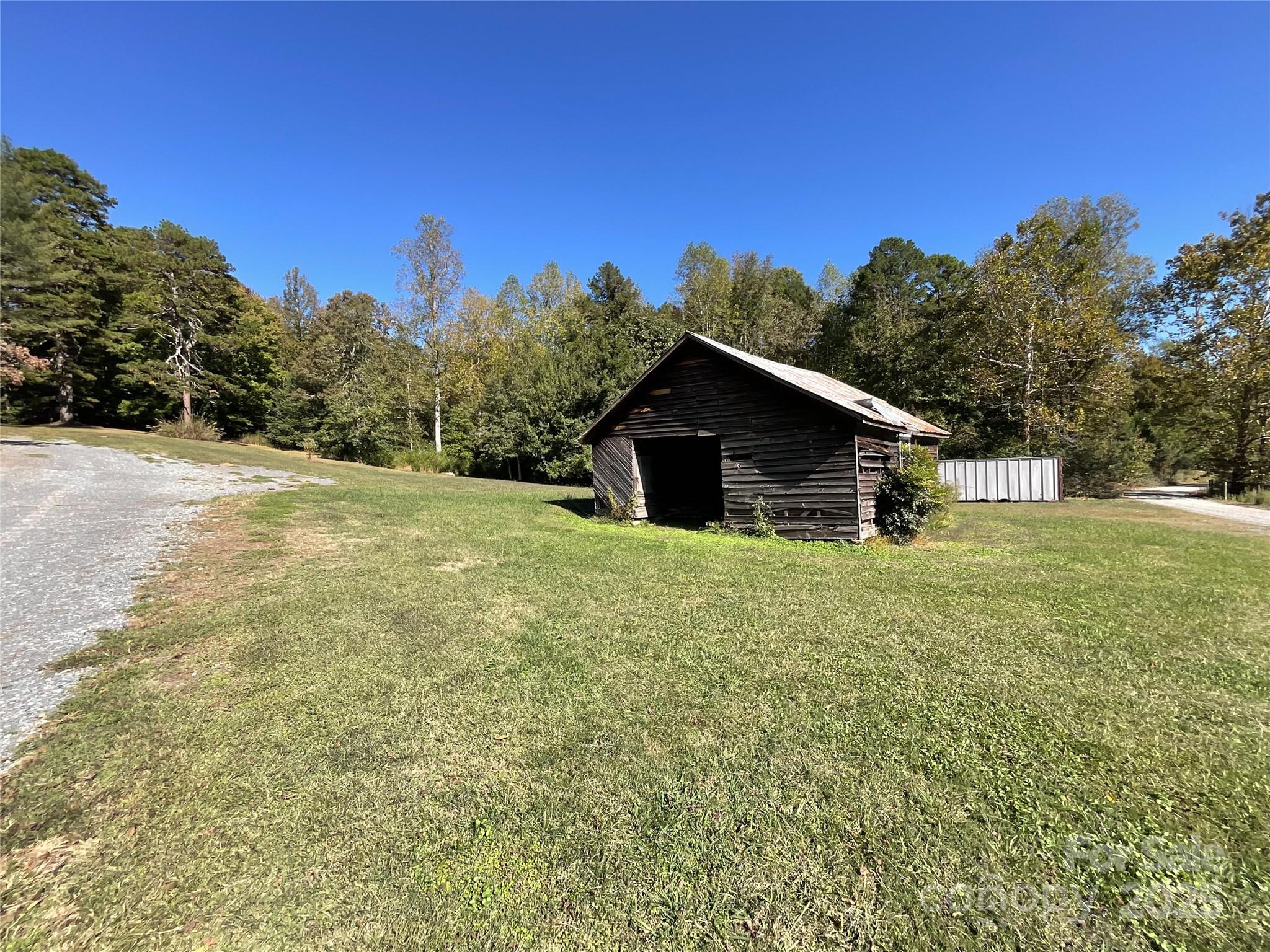 2006 Okeewemee Road Star, NC 27356 - Photo 40 of 48 a view of a house with a backyard