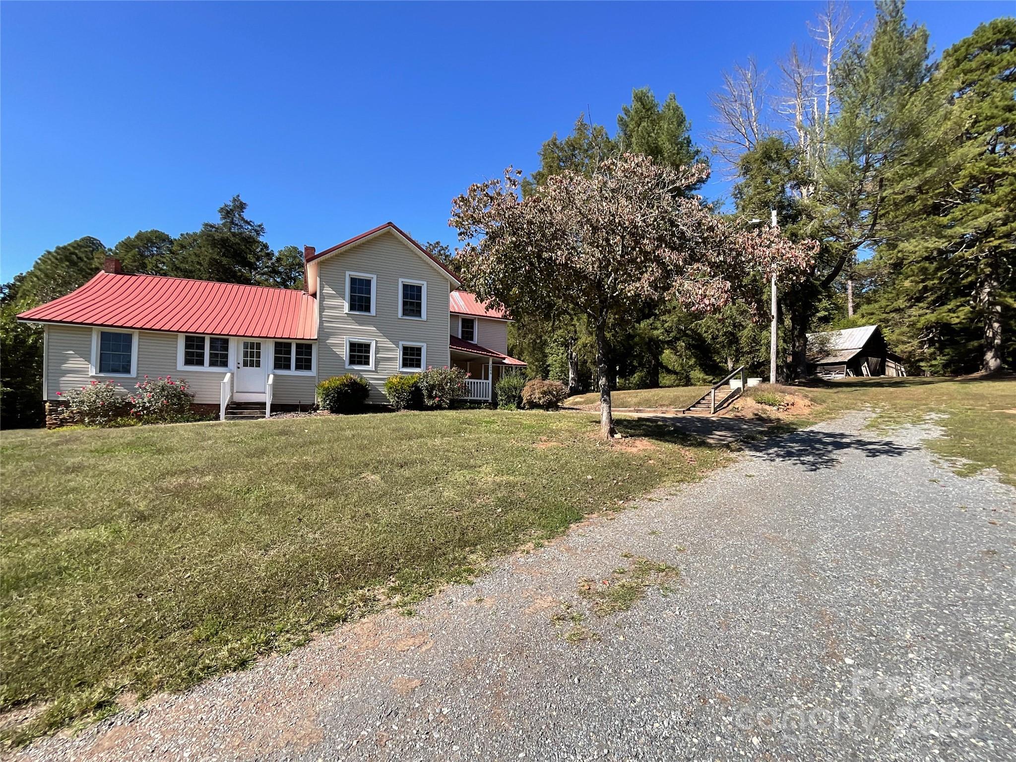2006 Okeewemee Road Star, NC 27356 - Photo 42 of 48 a front view of a house with a yard
