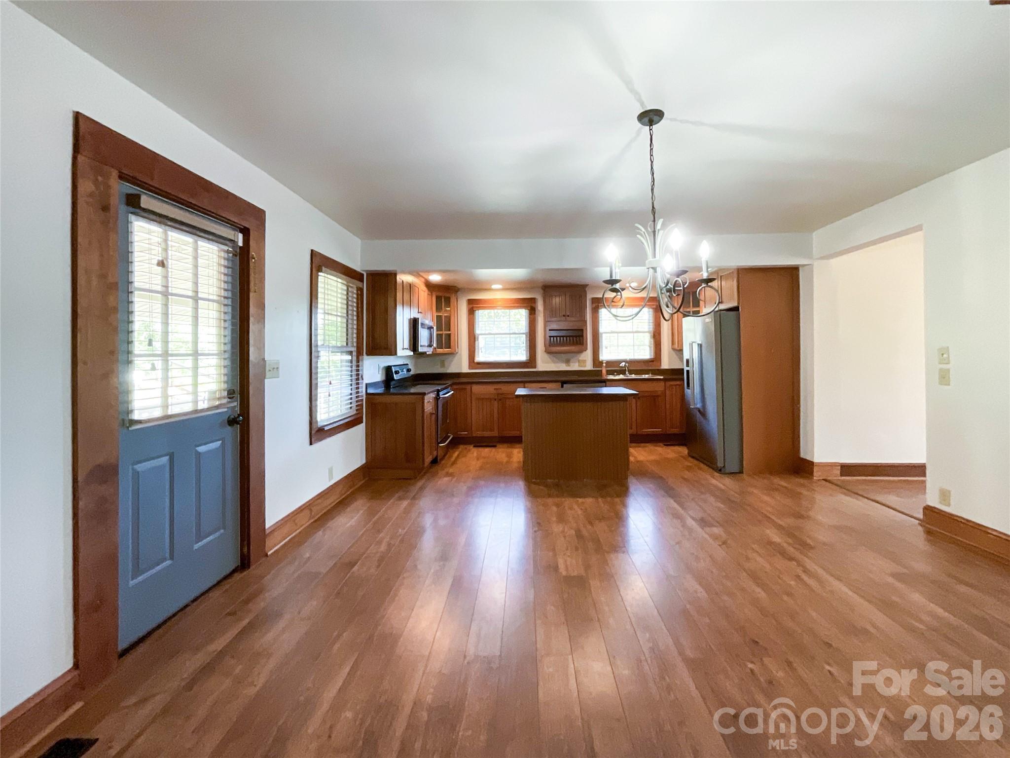 2006 Okeewemee Road Star, NC 27356 - Photo 5 of 47 a view of a kitchen with granite countertop wooden floors and stainless steel appliances