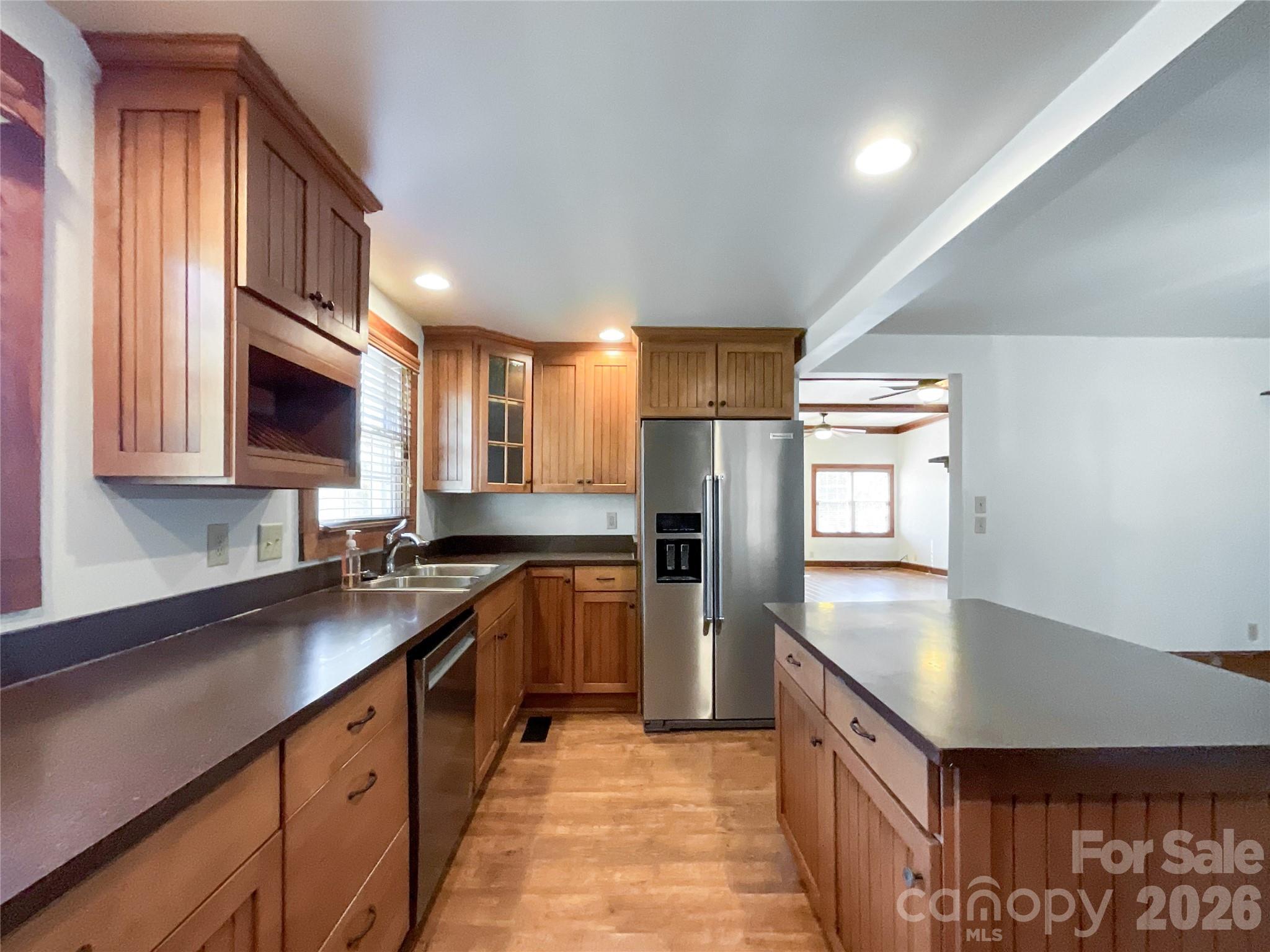 2006 Okeewemee Road Star, NC 27356 - Photo 9 of 47 a kitchen with stainless steel appliances granite countertop a sink stove and refrigerator