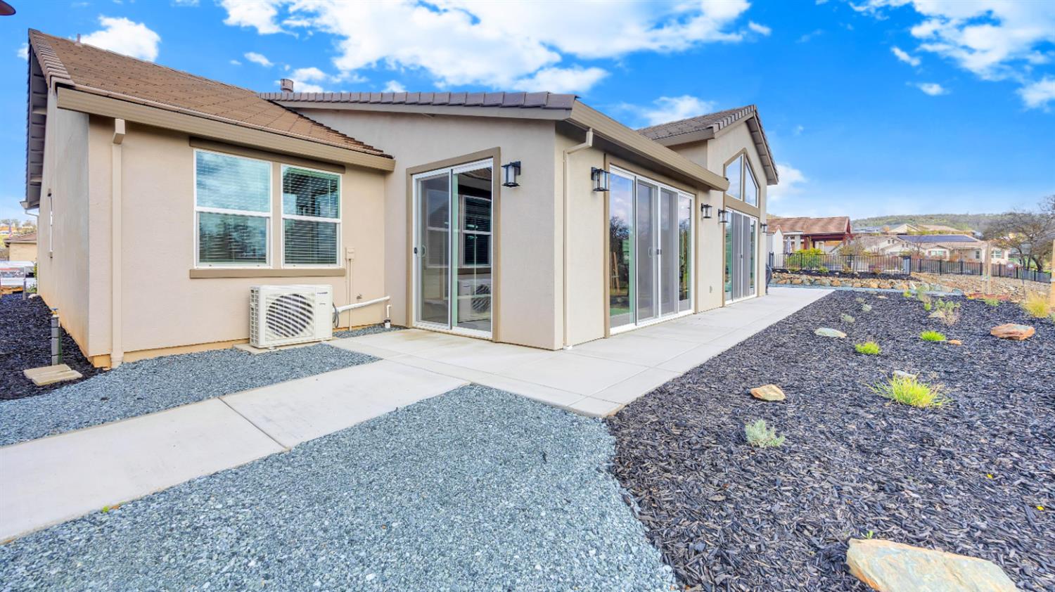 133 Palisades Place Copperopolis, CA 95228 - Photo 47 of 95 a front view of a house with a yard