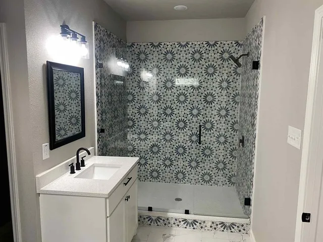 a bathroom with a bathtub and a sink
