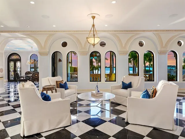 a view of entryway with a rug and wooden floor