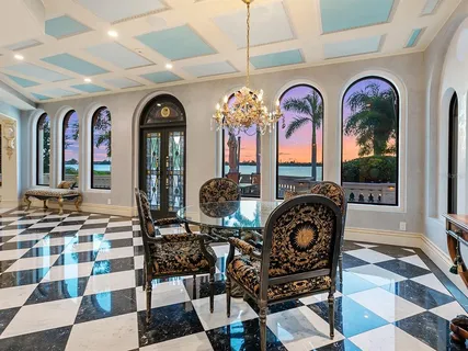 a stove top oven sitting inside of a kitchen