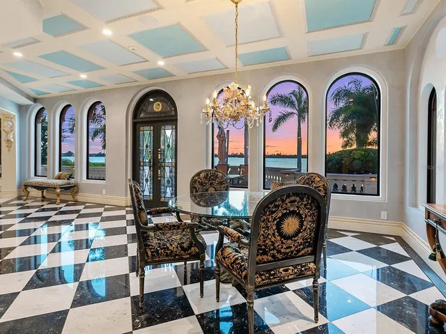 a stove top oven sitting inside of a kitchen