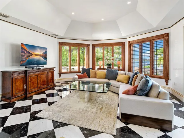 a bathroom with double vanity sinks and a mirror